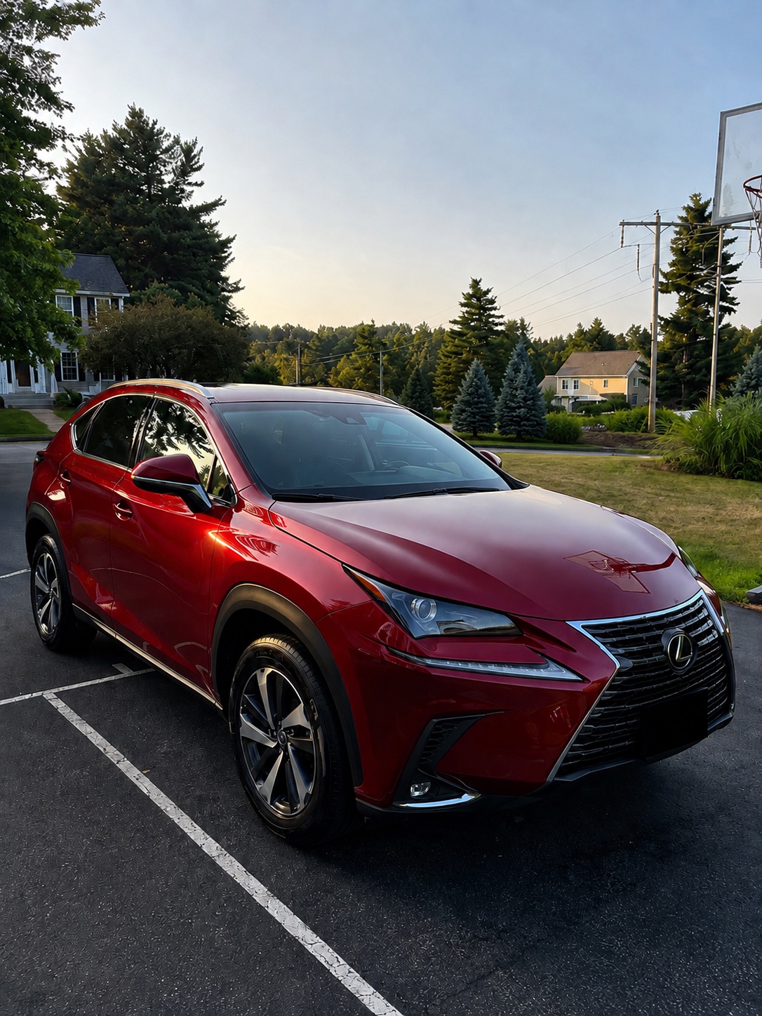 Red Lexus SUV restored to a deep shine after a Shine Pro detail